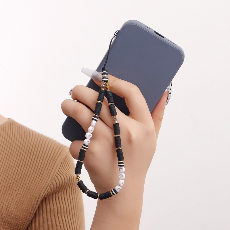 Women Accessories Picture - Chaîne de téléphone en argile œil